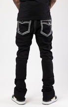 Stacked jeans with bold stitching details and flared bottom leg.