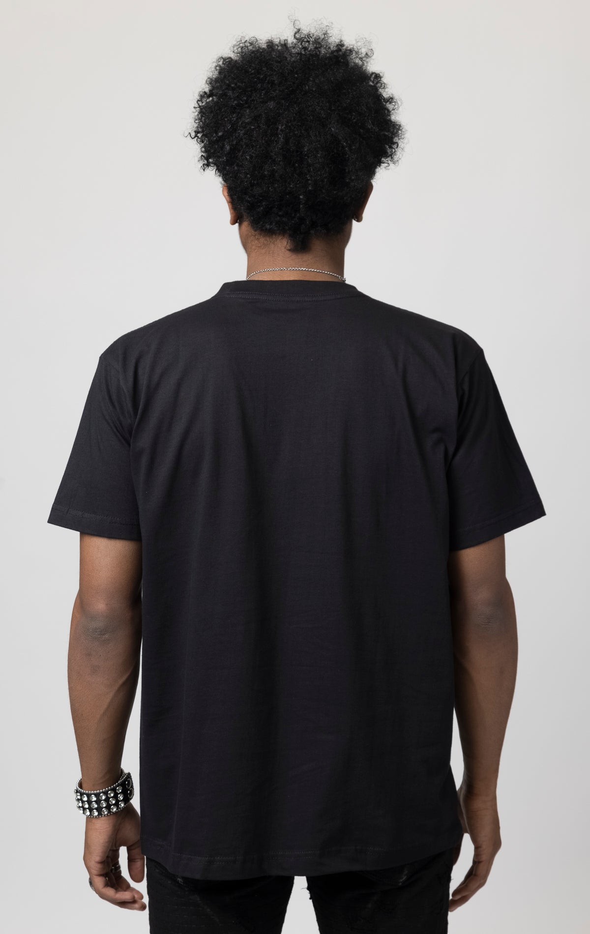 Oversized T-shirt with ribbed crew neck and a printed design on the front.