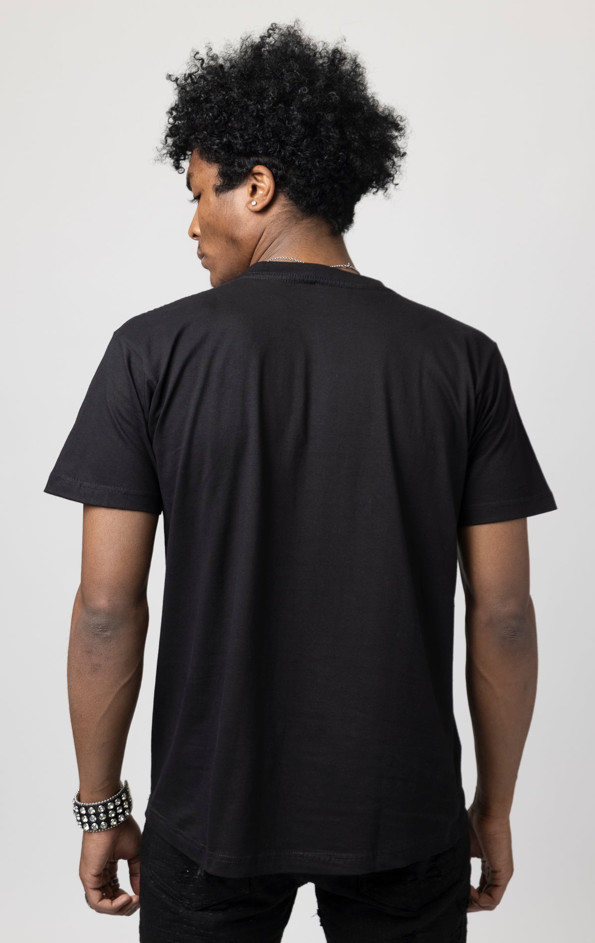 Oversized T-shirt with ribbed crew neck and a printed design on the front.