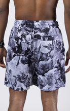 black Mesh shorts with an all-over print, zipper side pockets, and a drawstring waist