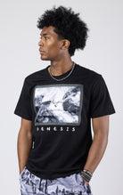 A crew neck graphic t-shirt with a Genesis design, available in creme and black.