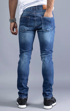 Men's blue slim-fit jeans made from 98% cotton and 2% Lycra®. The jeans are machine washable and available in all sizes with a 34-inch inseam.