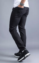 Men's black slim-fit jeans made from 98% cotton and 2% Lycra®. The jeans are machine washable and available in all sizes with a 34-inch inseam.