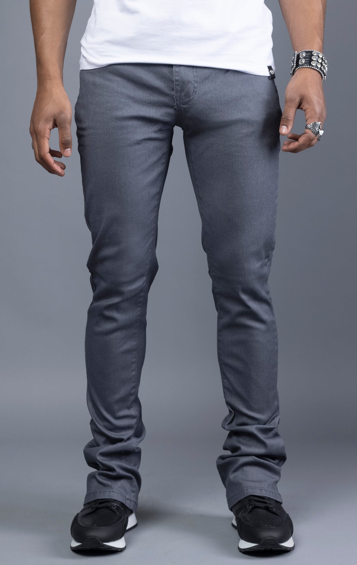 Charcoal Glossy denim with a regular rise, flared stacked jeans