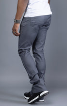 Charcoal Glossy denim with a regular rise, flared stacked jeans