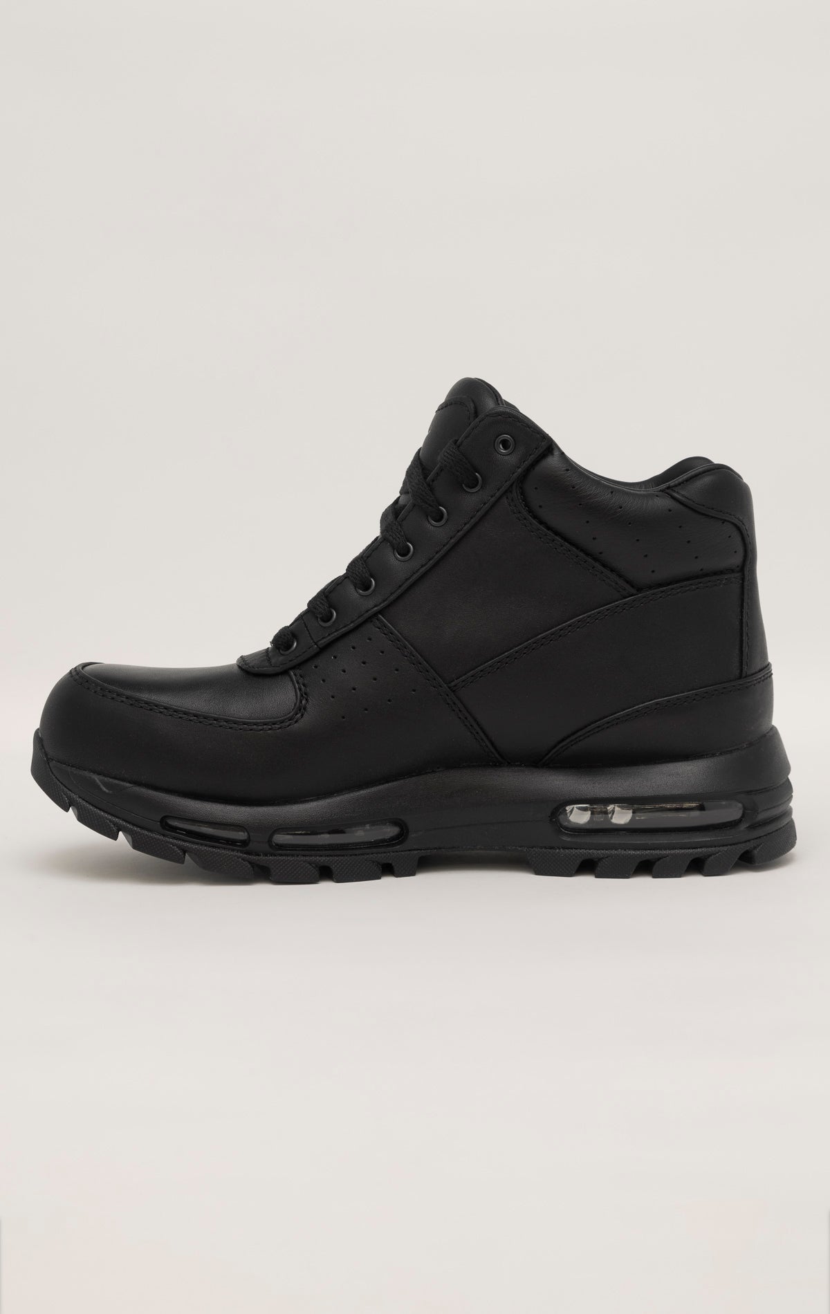 Black Nike Air Max Goadome sneakers with visible Air unit in the heel and lugged outsole for traction.