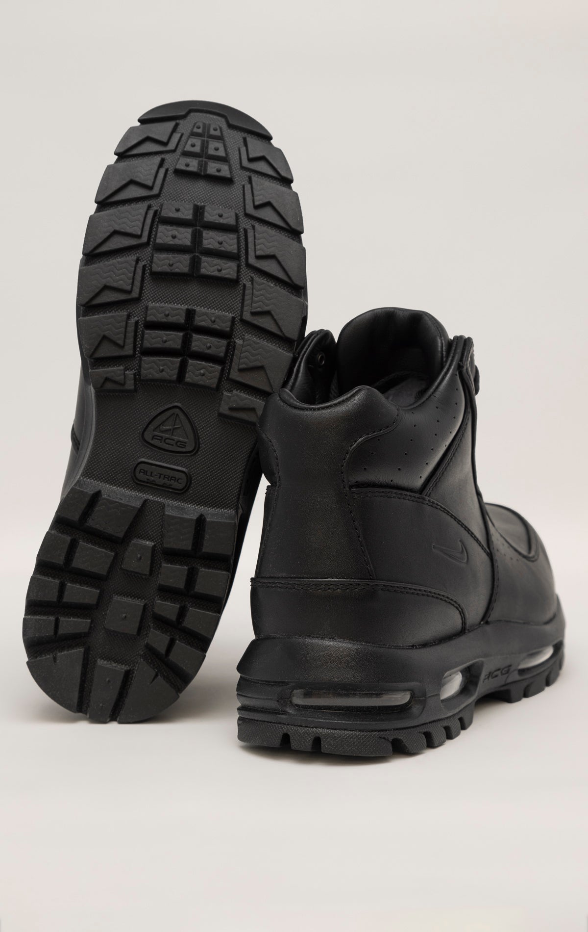 Black Nike Air Max Goadome sneakers with visible Air unit in the heel and lugged outsole for traction.