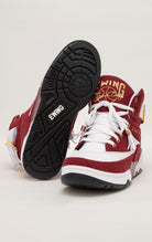 Burgundy and white high-top sneakers with gold accents, co-branded by Ewing Athletics and Ol' Dirty Bastard (ODB) of the Wu-Tang Clan.