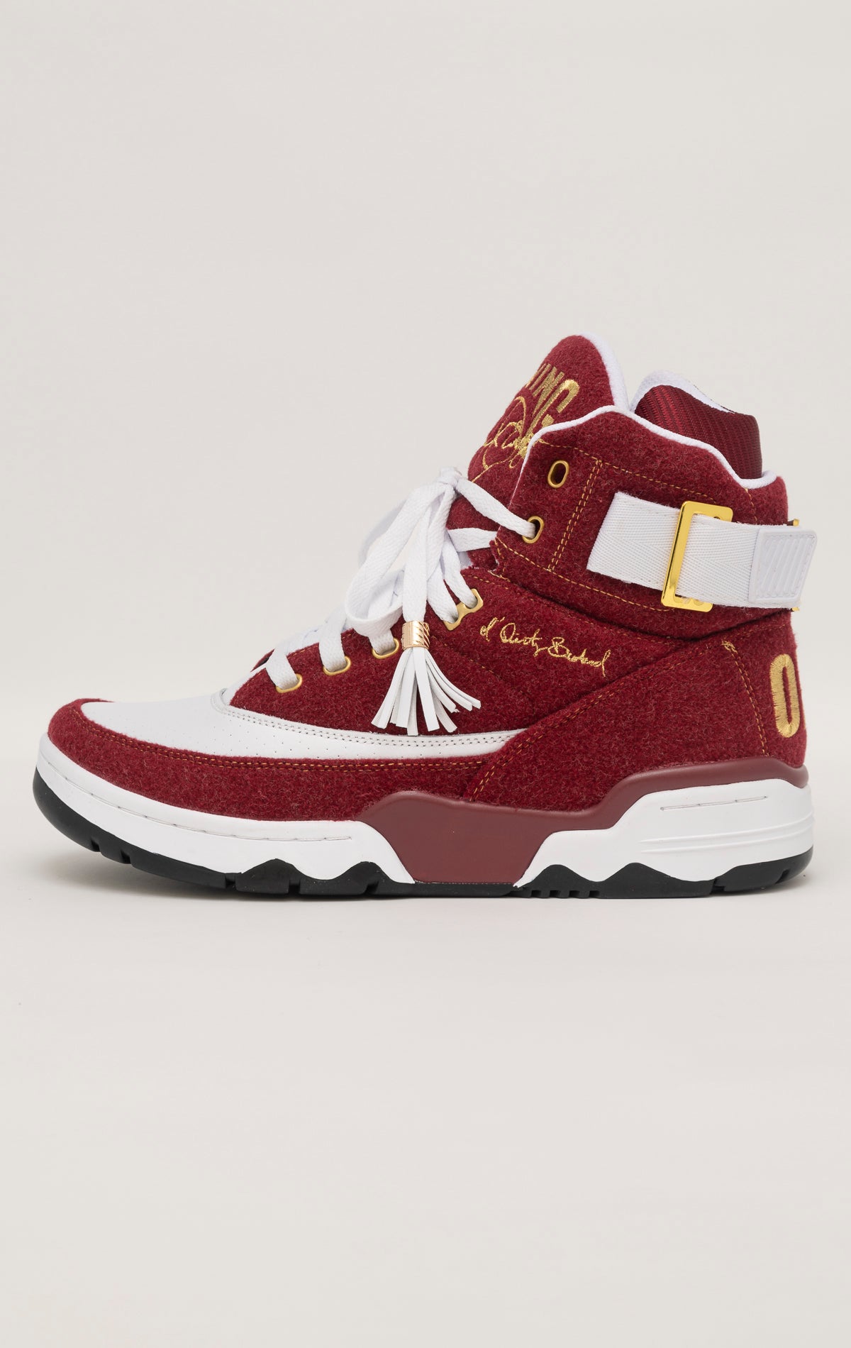 Burgundy and white high-top sneakers with gold accents, co-branded by Ewing Athletics and Ol' Dirty Bastard (ODB) of the Wu-Tang Clan.