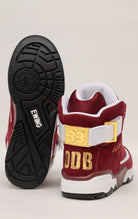 Burgundy and white high-top sneakers with gold accents, co-branded by Ewing Athletics and Ol' Dirty Bastard (ODB) of the Wu-Tang Clan.