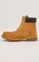 Timberland 6-Inch boots in premium wheat nubuck leather with waterproof construction, padded collar, and lug outsole