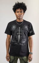 black CORE DAGGER vintage graphic t-shirt. The shirt is made from 100% cotton with a vintage wash and features a high-definition digital graphic on the front.