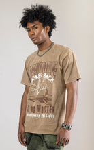 A DOCTRINE STRIKE BACK T-shirt featuring a high-definition digital graphic print across the front. The shirt is made from 100% cotton and has a vintage-washed look.