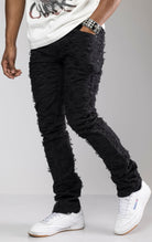 Stacked Skinny Pants in Stretch Twill in black. Made from a comfortable stretch twill fabric for all-day comfort. Features a skinny fit with a stacked design, perfect for creating a trendy cuffed look without extra effort