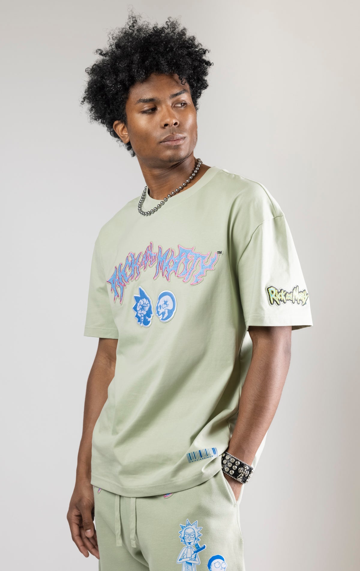 Rick And Morty graphic t-shirt in a relaxed fit with dropped shoulders and a crew neck. The shirt features heat-sealed graphics and a chenille applique with embroidered details.