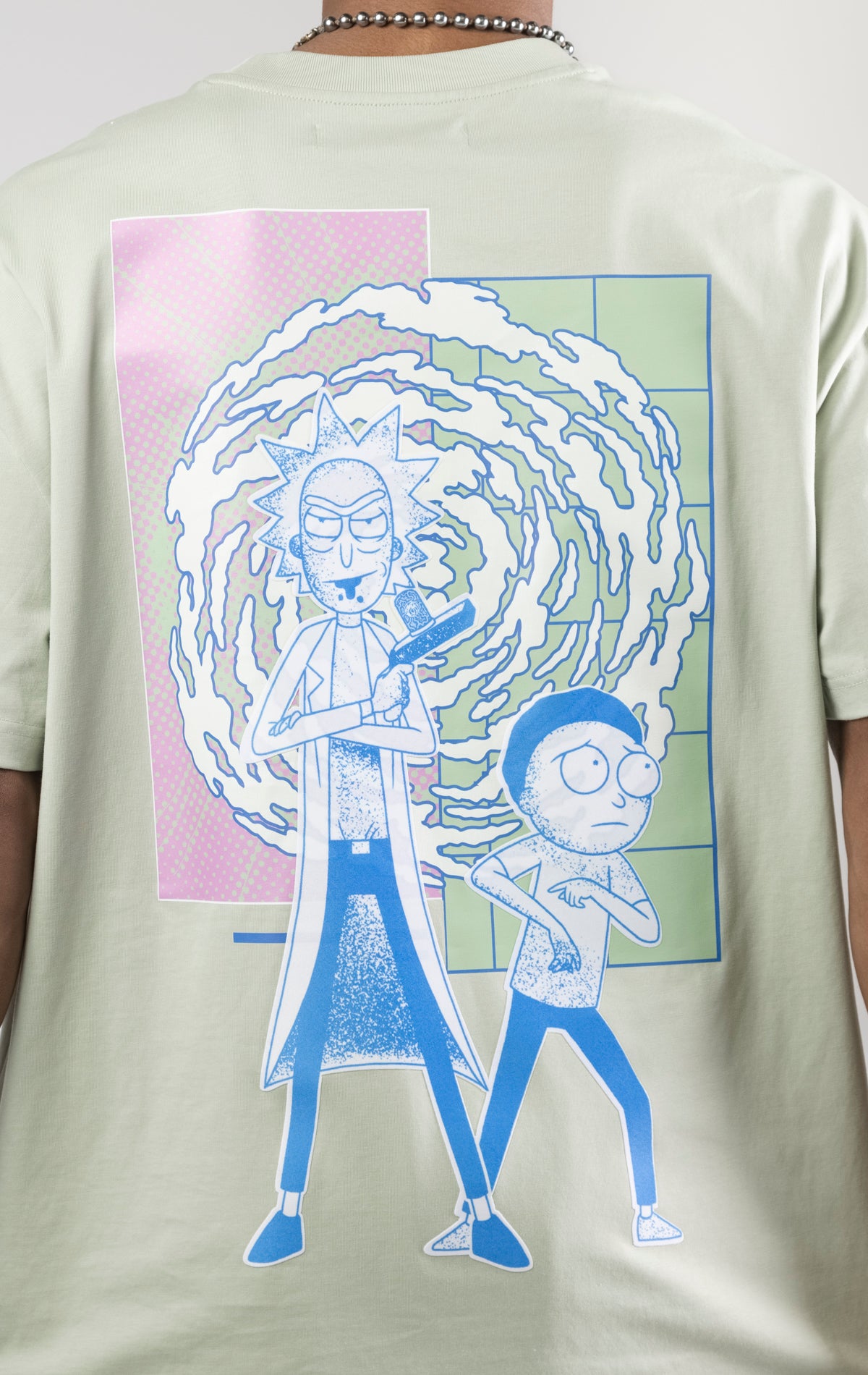 Rick And Morty graphic t-shirt in a relaxed fit with dropped shoulders and a crew neck. The shirt features heat-sealed graphics and a chenille applique with embroidered details.