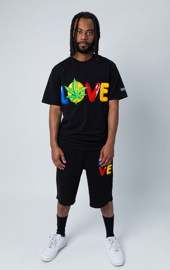 Black set of shirt and shorts with "LOVE"  graphic.