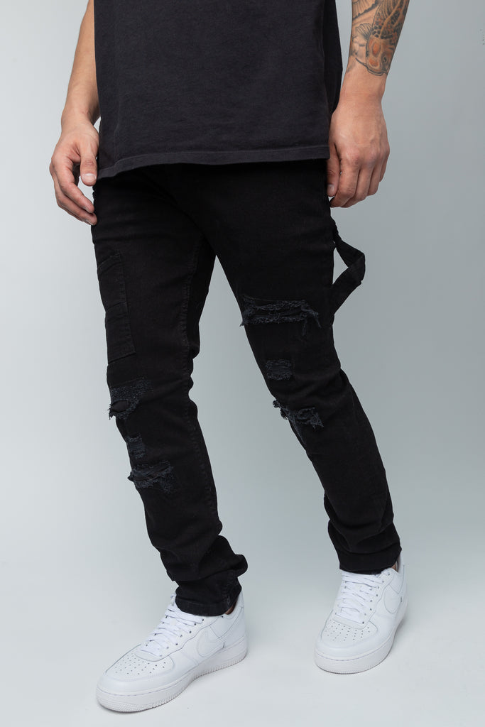 Fixed waist ripped cargo style black jeans.