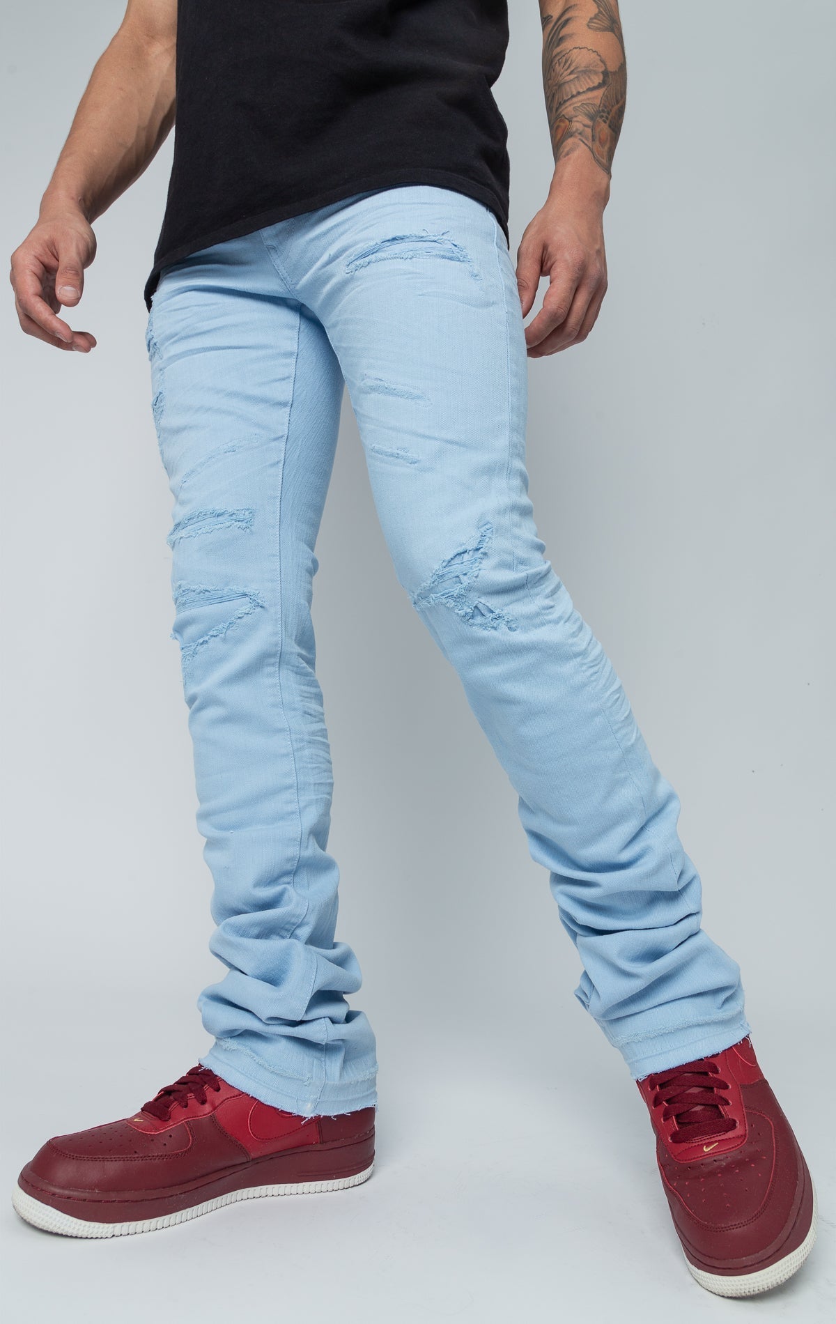 sky blue stacked denim with ripped design