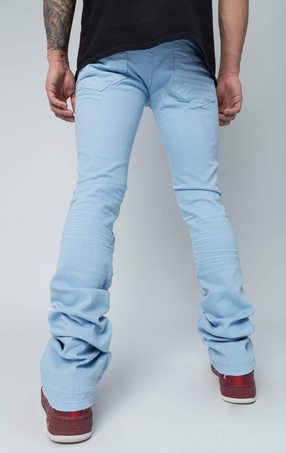 sky blue stacked denim with ripped design