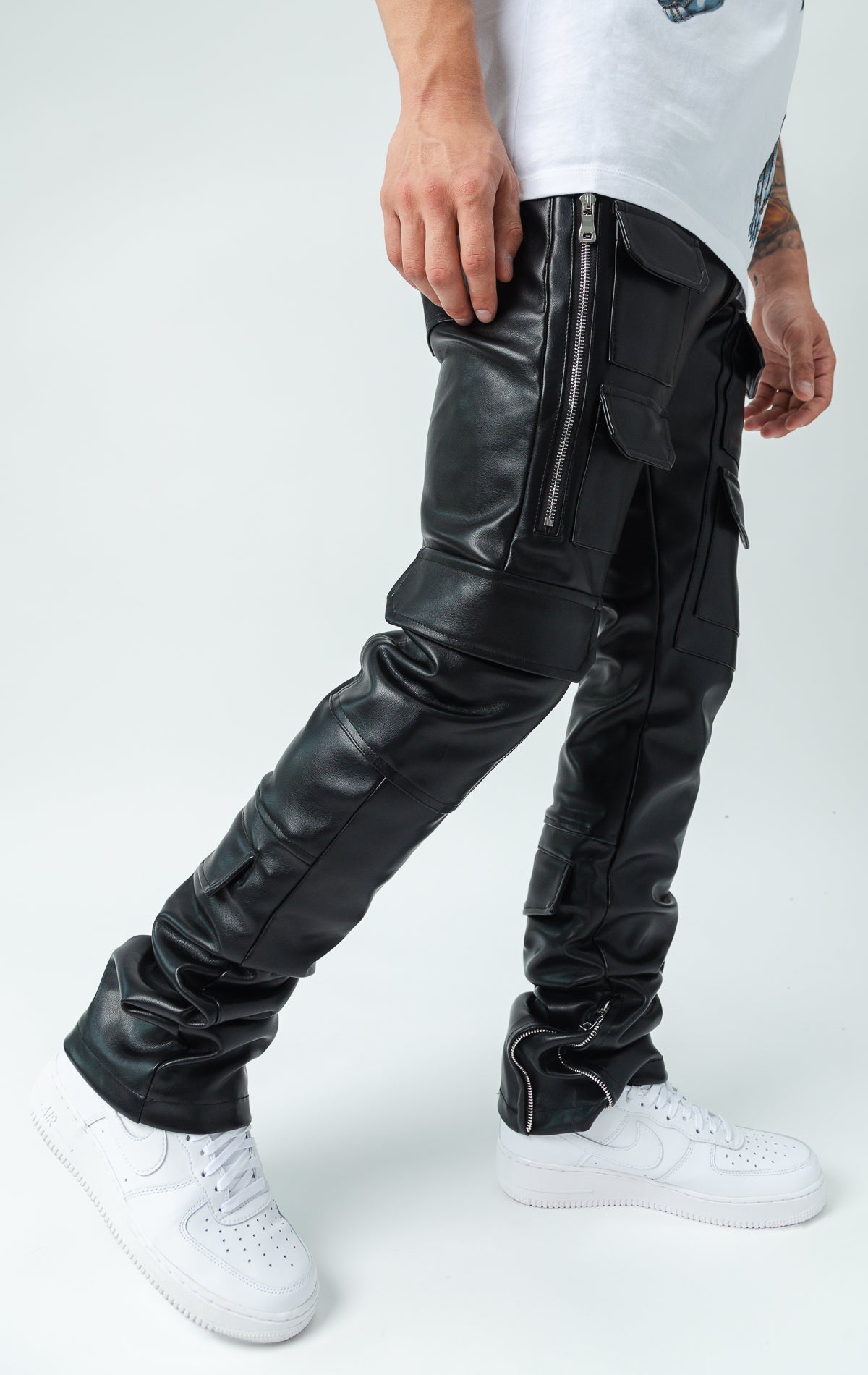 Stretch faux black leather biker pants. Slim fit.