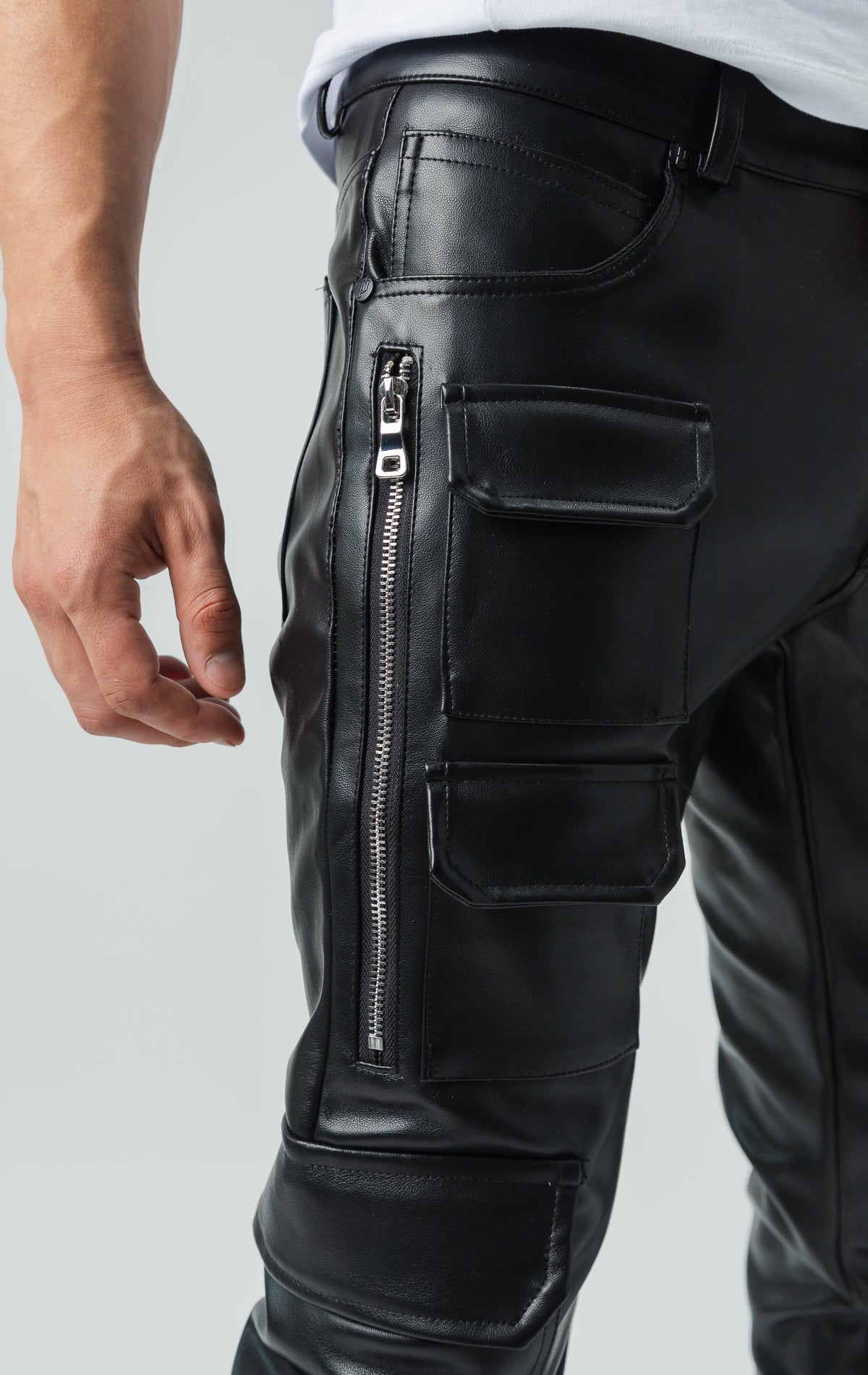 Stretch faux black leather biker pants. Slim fit.