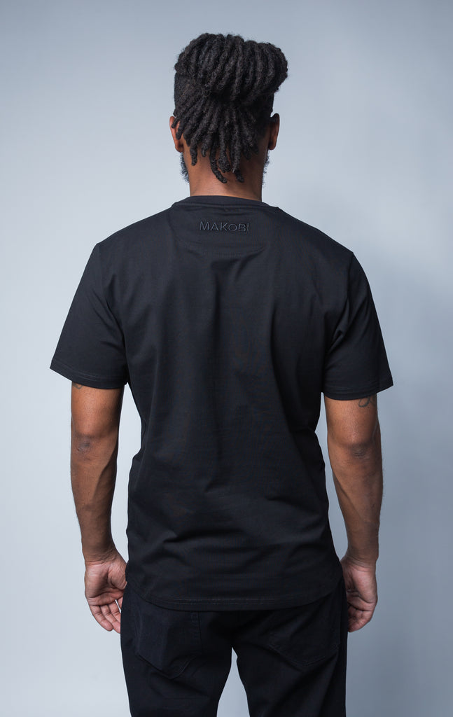 Black t-shirt with Makobi logo on back