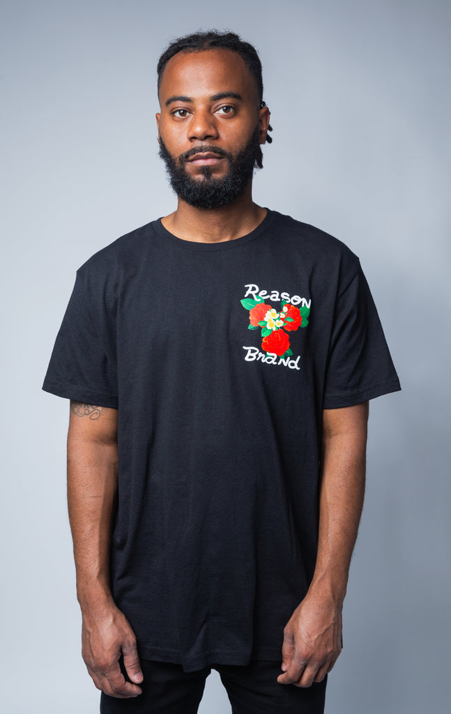 Reason Brand black t-shirt with roses graphic on top left 