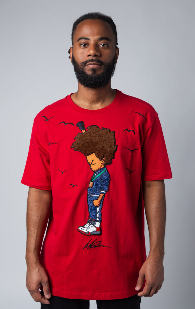 Red custom-knit T-shirt displays a graphic of Huey and Riley in their teenage years.