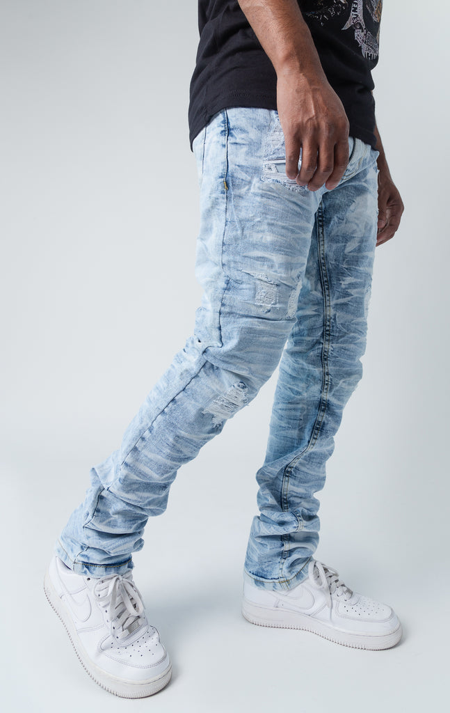 Ice blue ripped low-waisted and slim jeans.