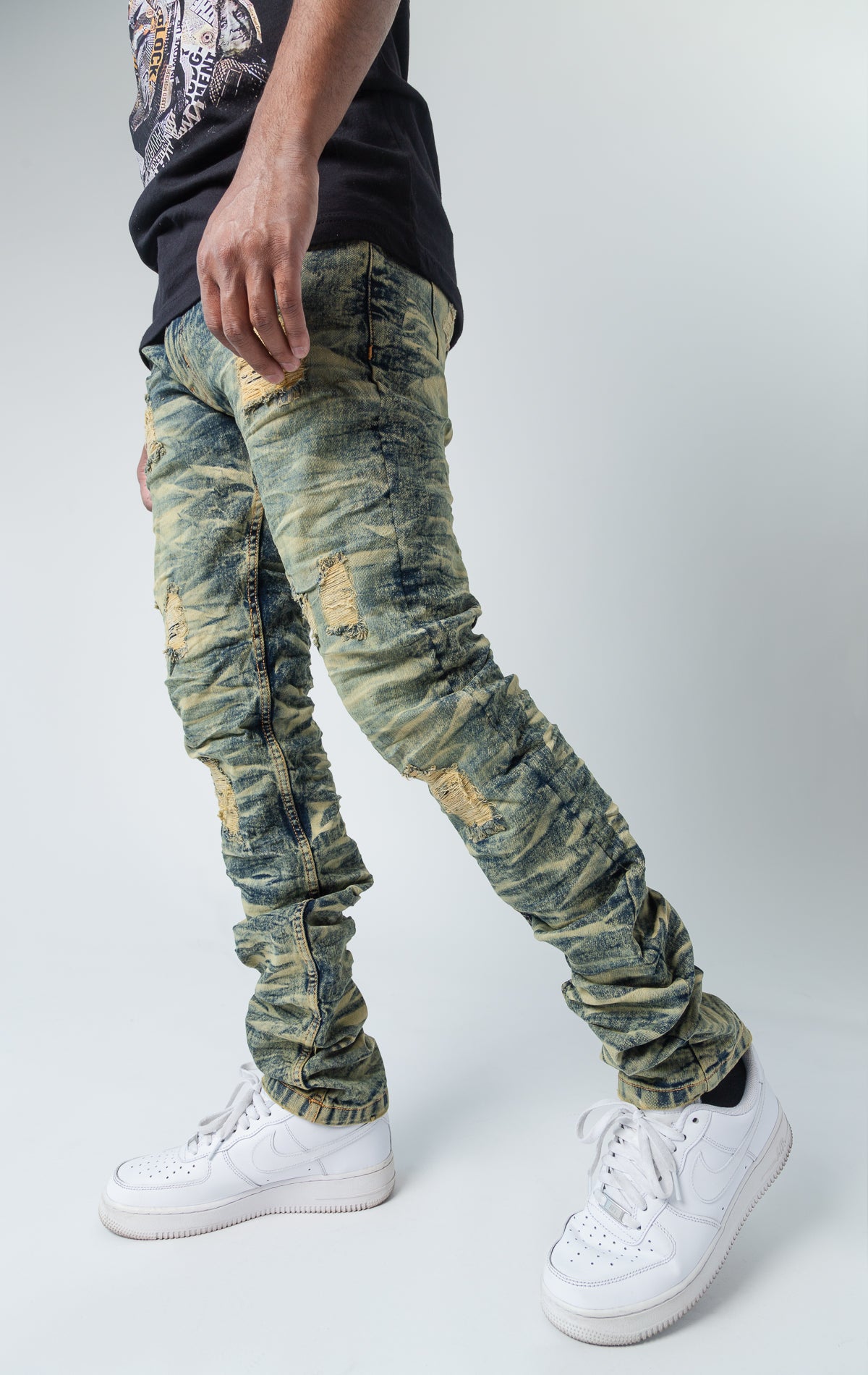 Tinted ripped low-waisted slim jeans.