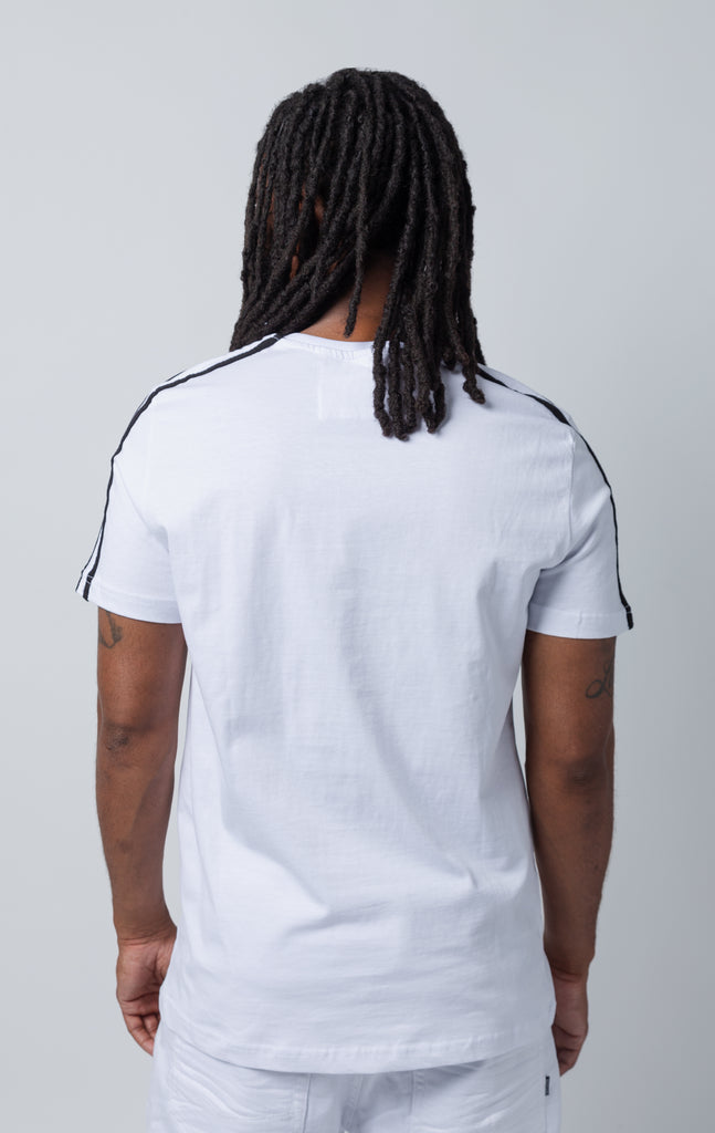 White t-shirt back with black stripes on shoulders.