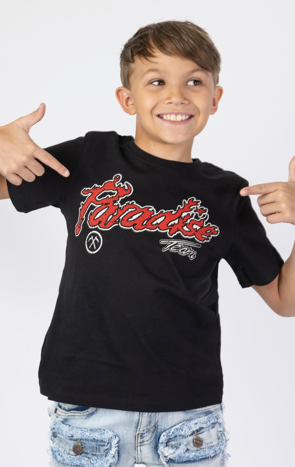 Kids Paradise Tour T-shirt. Features a classic crewneck, short sleeves, and screen-printed graphics on the front and back. Made from premium 220 GSM cotton for a soft and comfortable feel.