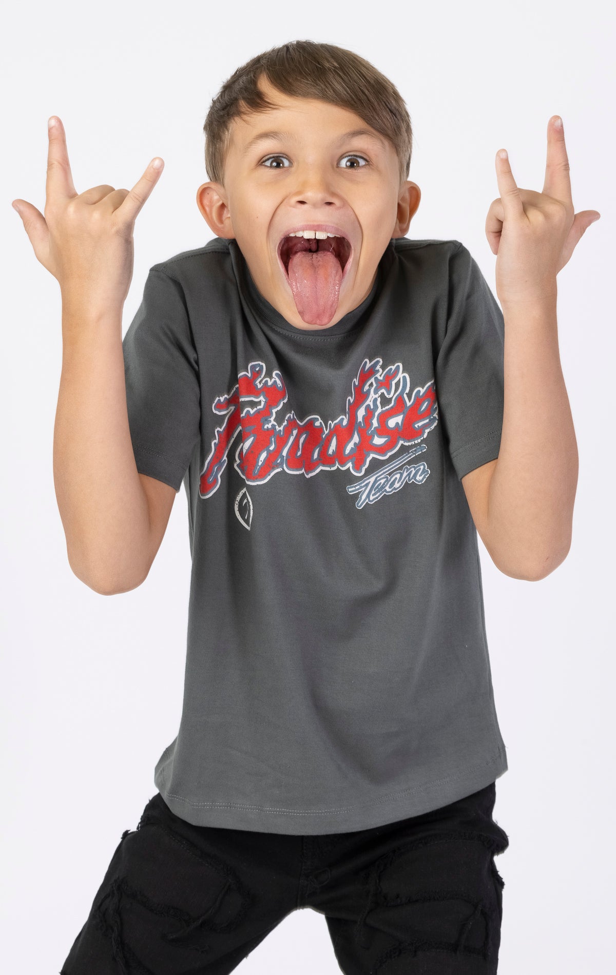 Kids Paradise Tour T-shirt. Features a classic crewneck, short sleeves, and screen-printed graphics on the front and back. Made from premium 220 GSM cotton for a soft and comfortable feel.