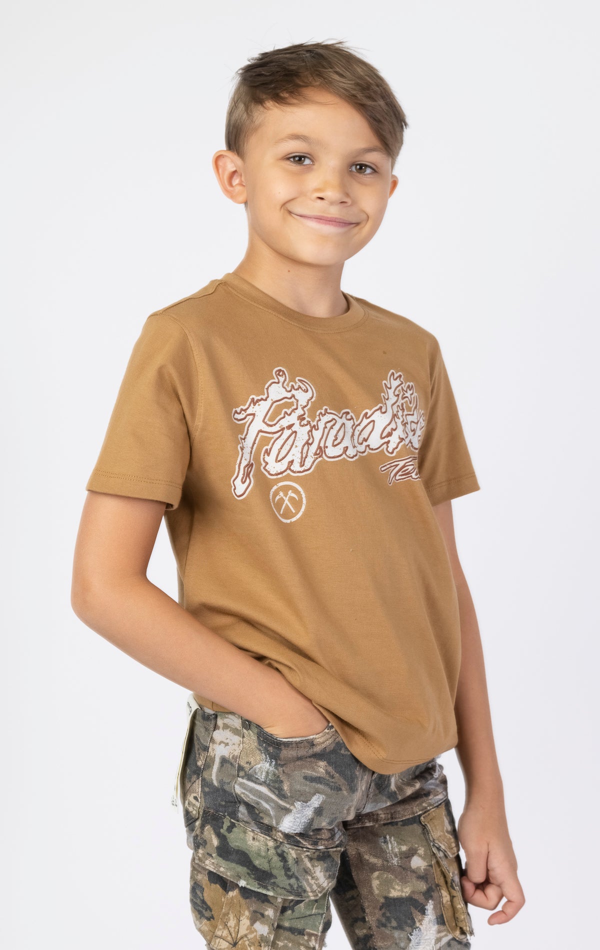 Kids Paradise Tour T-shirt. Features a classic crewneck, short sleeves, and screen-printed graphics on the front and back. Made from premium 220 GSM cotton for a soft and comfortable feel.