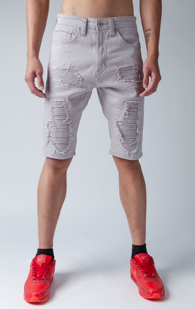 Grey denim shredded shorts with fused shreds, crinkle effect through out