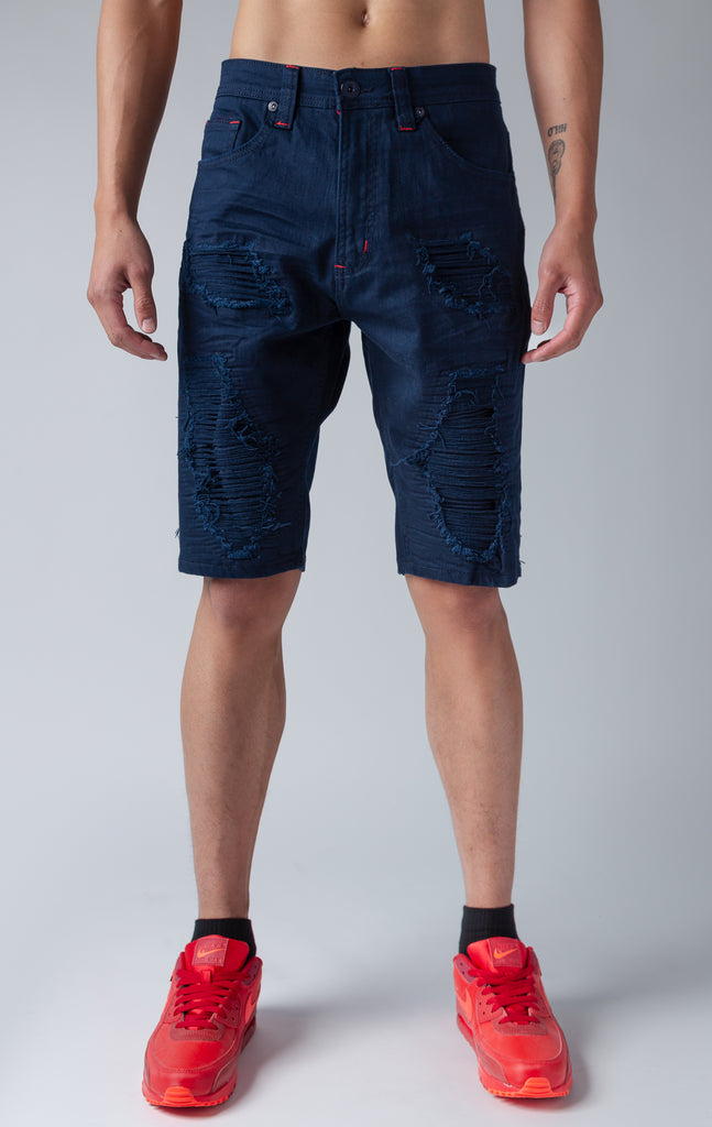 Navy denim shredded shorts with fused shreds, crinkle effect through out