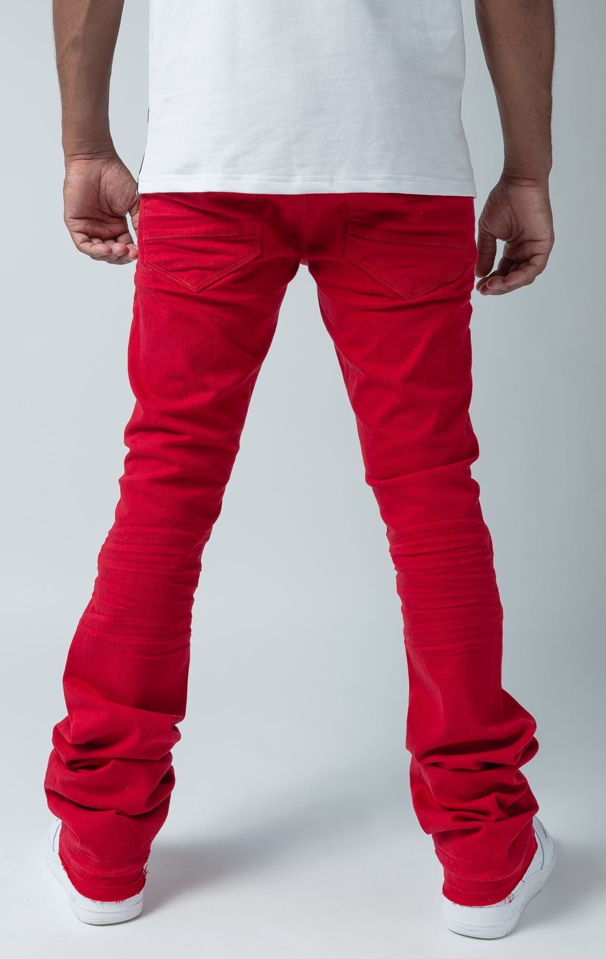 red stacked denim with ripped design