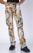 Super Skinny Camo Jeans. Made from a blend of 98% cotton and 2% elastane. Features a tight fit from waist to thigh, extended inseam, large double cargo pockets, and a camo print.