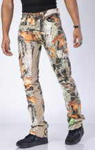 Super Skinny Camo Jeans. Made from a blend of 98% cotton and 2% elastane. Features a tight fit from waist to thigh, extended inseam, large double cargo pockets, and a camo print.