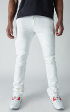 white stacked denim with ripped design