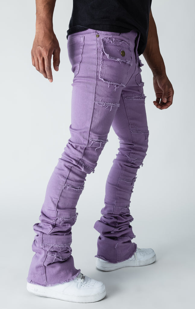 Purple patterned stitched, flared denim stacked jeans.