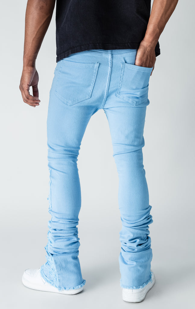 Baby Blue patterned stitched, flared denim stacked jeans.