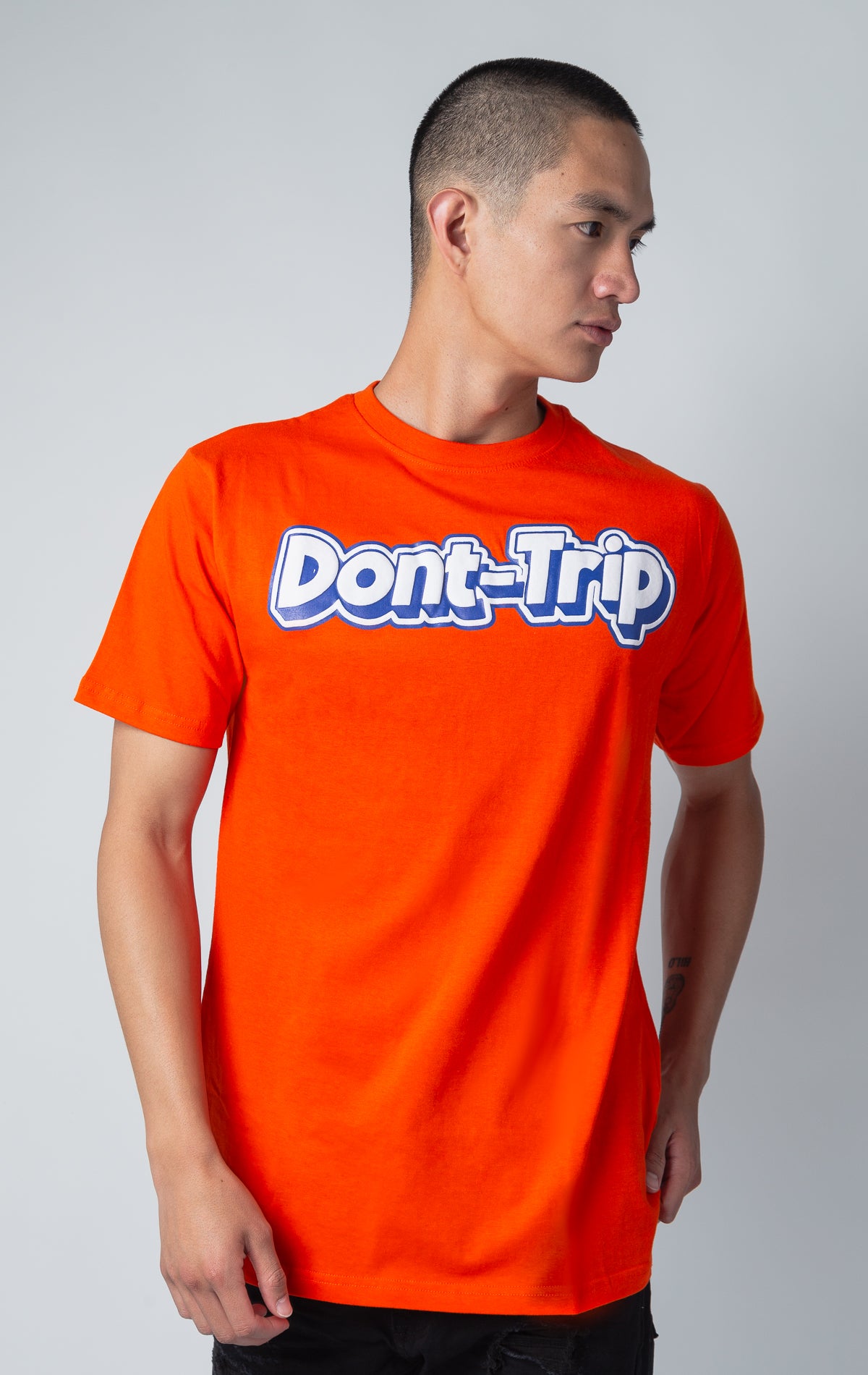 "Don't-trip" graphic T-shirt in orange