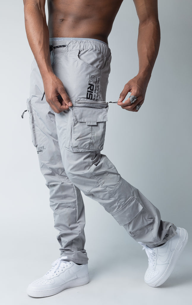 Grey windbreaker utility pants, sleek fit with an open bottom jogger style