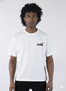 White short-sleeve t-shirt showing the back, featuring a large, colorful, graffiti-style illustration of a cartoon character in a backwards cap and crown. The text "Bubu" and other tags surround the central image.