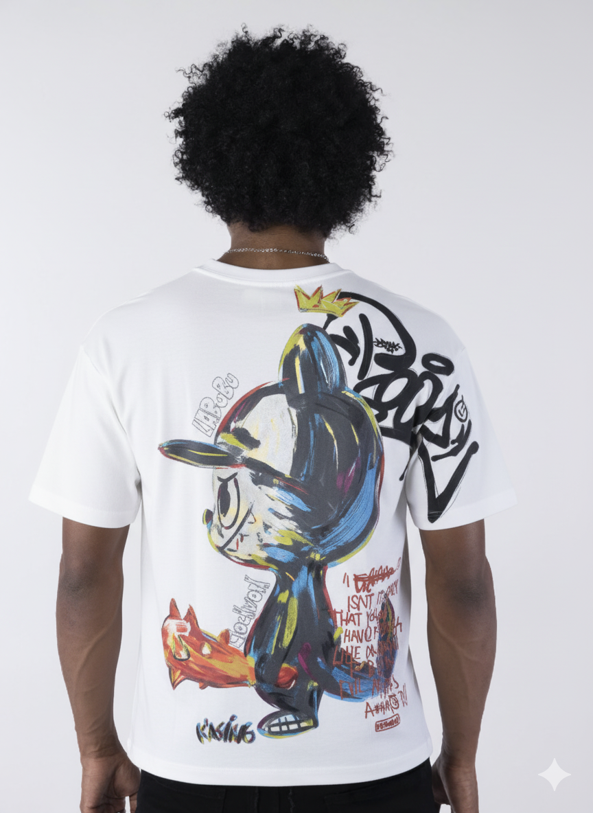 Person wearing a white t-shirt with colorful graphic design on the back