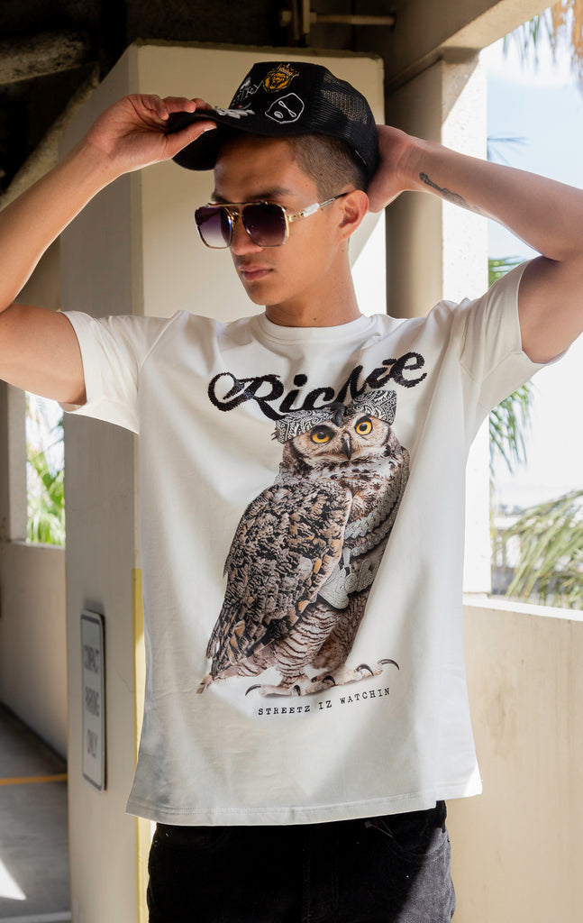 T-shirt. Featuring a bold owl graphic printed