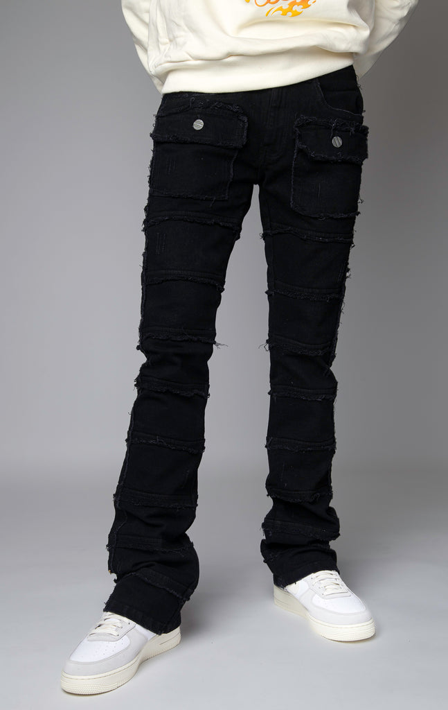 ice blue Stacked denim pants, distressed and paneled with a raw finishing