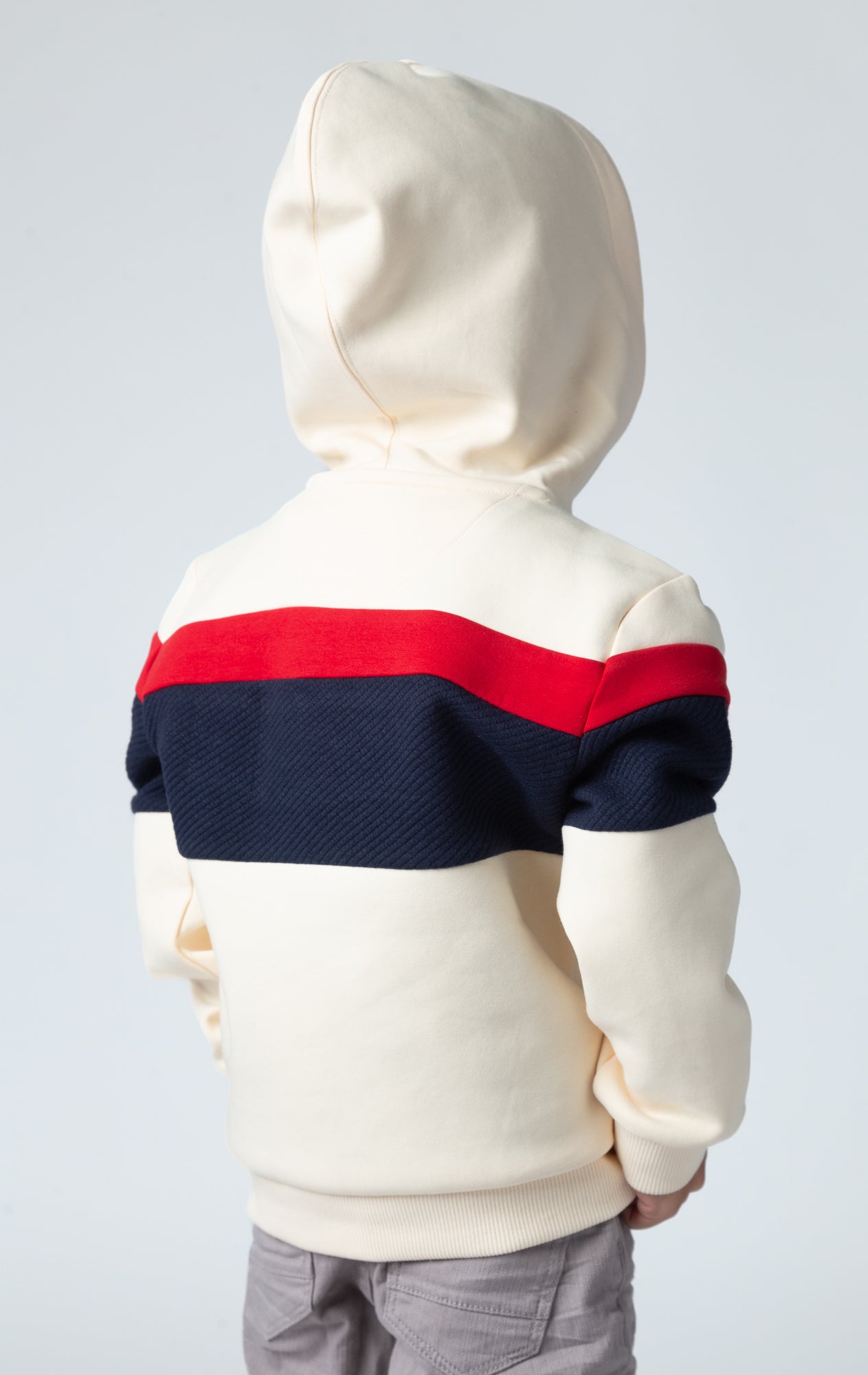 Made from soft and cozy fabric. Monogram kid's hoodie back
